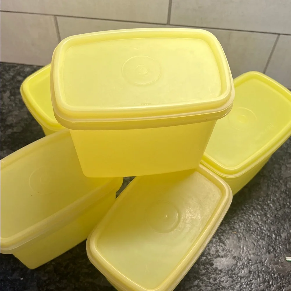 5 piece set of yellow storage containers by Tupperware. Vintage pieces e…